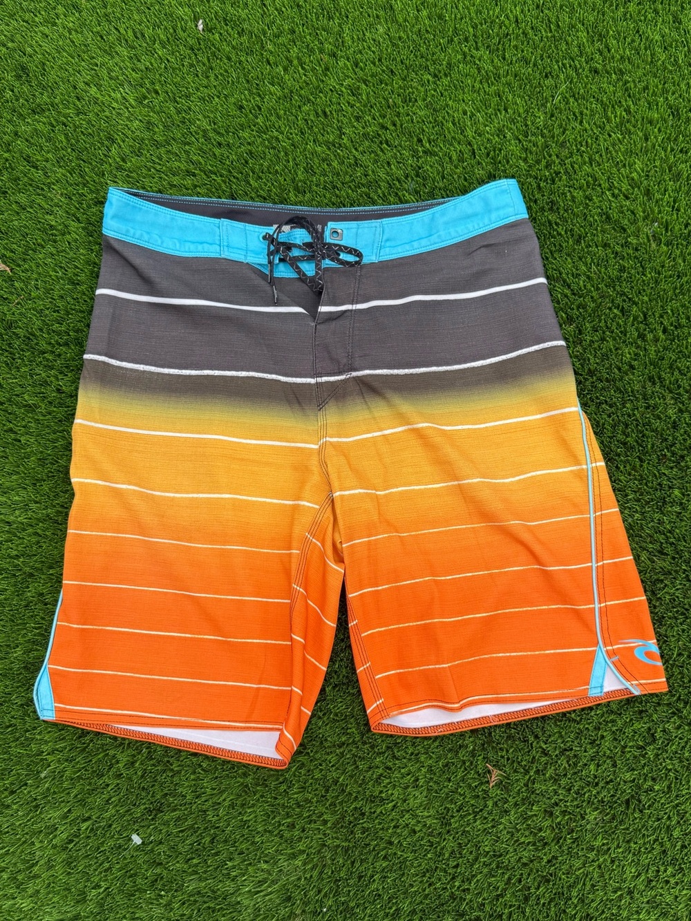 Rip Curl mirage Men's Boardshorts with Teal and orange swim
